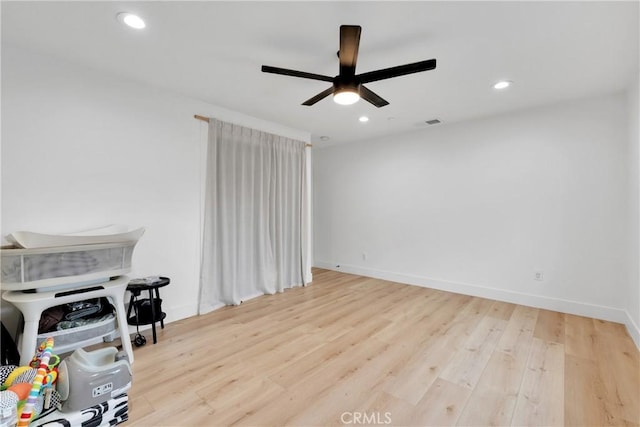 interior space featuring ceiling fan and light wood-type flooring