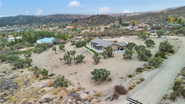 aerial view featuring a mountain view