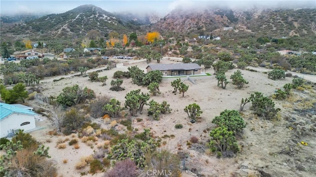 bird's eye view with a mountain view