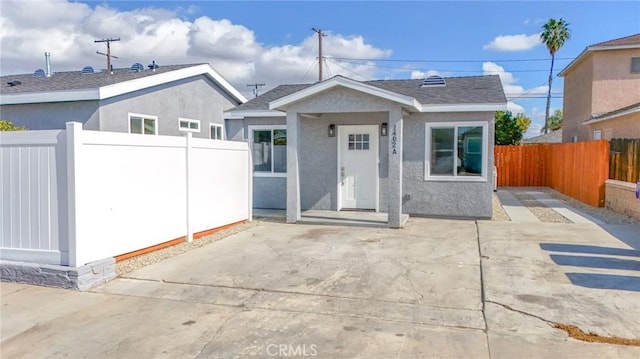 view of front of house with a patio