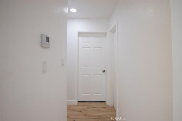 hallway featuring light hardwood / wood-style flooring