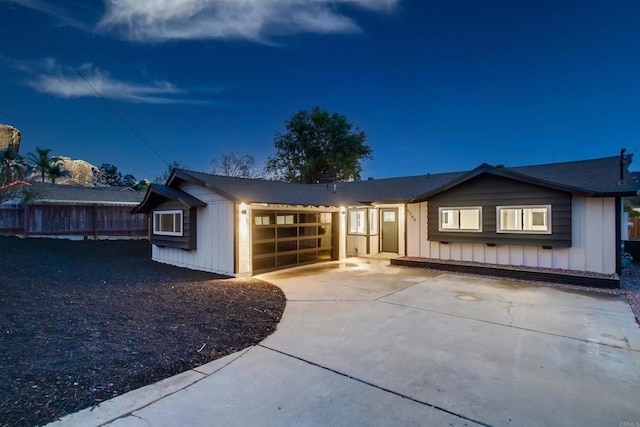 ranch-style home with a garage