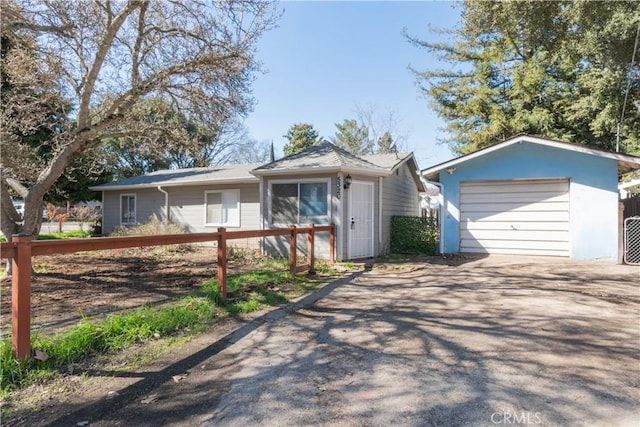 single story home with a garage