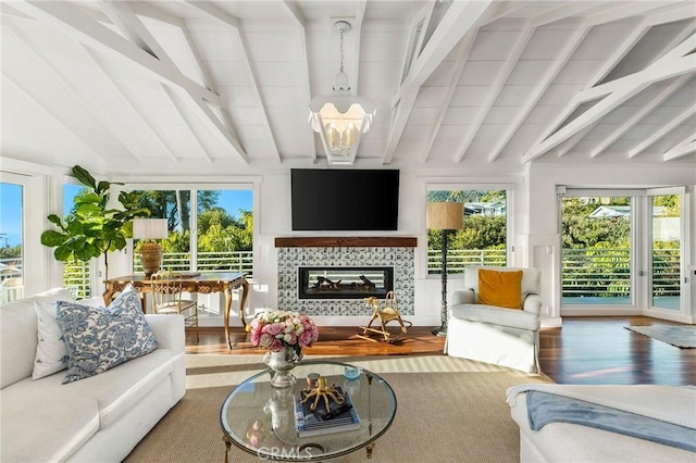 31777 5th Ave, Laguna Beach, CA 92651 - living room with wood finished floors, a tile fireplace, and a chandelier