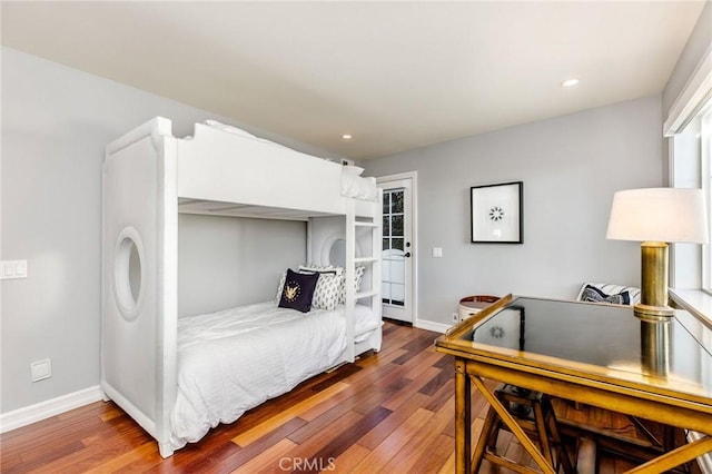 bedroom featuring recessed lighting, baseboards, and hardwood / wood-style flooring