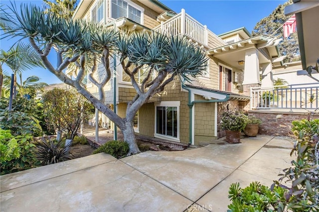 31777 5th Ave, Laguna Beach, CA 92651 - back of property featuring a balcony and a patio