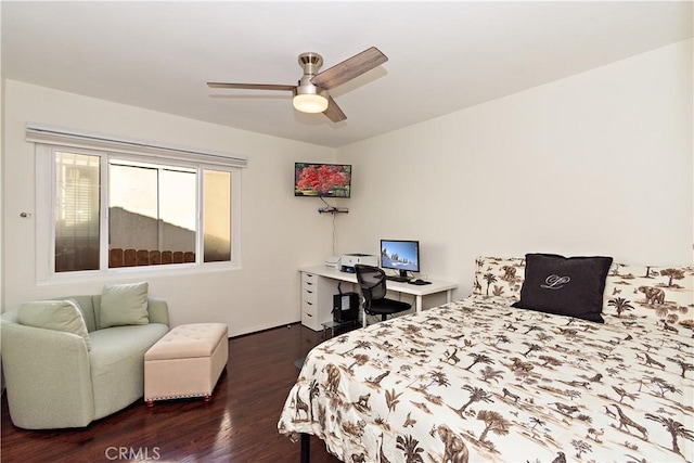 bedroom featuring dark wood-type flooring and ceiling fan