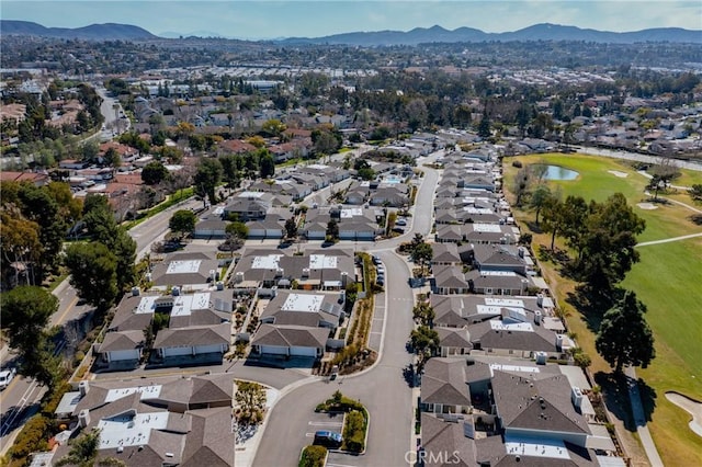 bird's eye view with a residential view and a mountain view