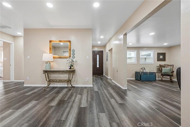 foyer with dark wood-type flooring