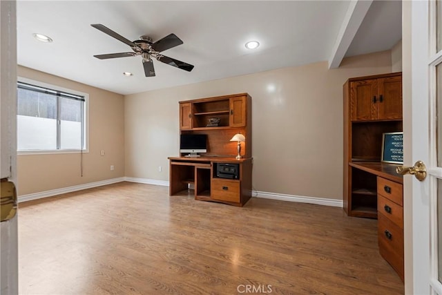 office area featuring wood-type flooring and ceiling fan