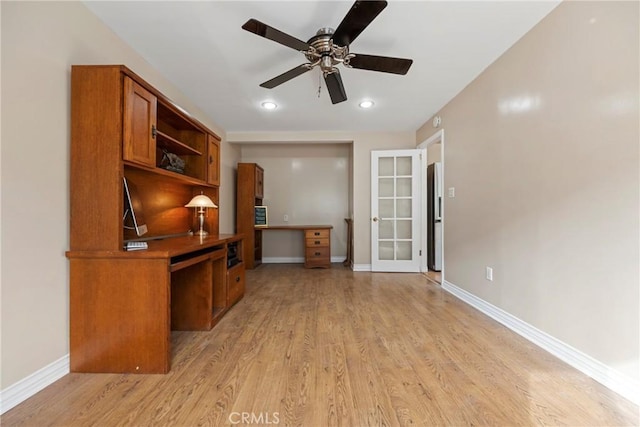 office area featuring light hardwood / wood-style flooring, french doors, and ceiling fan