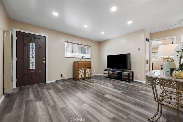 entrance foyer with dark hardwood / wood-style floors