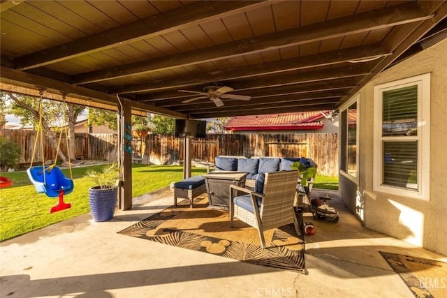 view of patio / terrace with a playground, outdoor lounge area, and ceiling fan