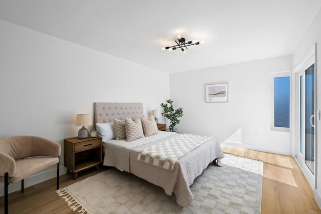 bedroom with light hardwood / wood-style flooring