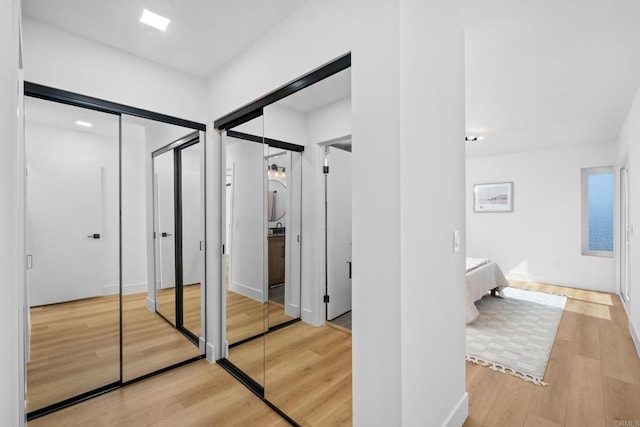 hallway featuring hardwood / wood-style flooring