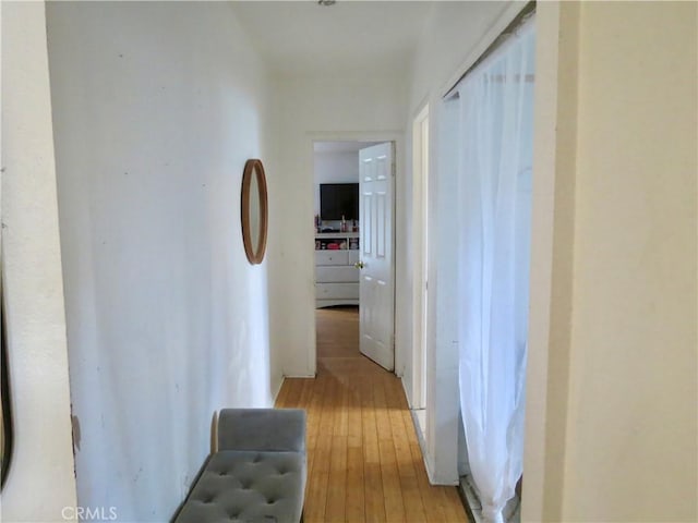 corridor featuring light hardwood / wood-style flooring