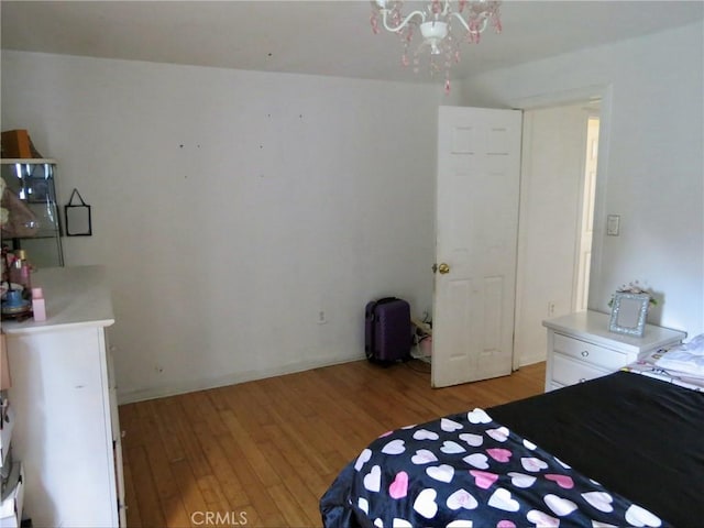 unfurnished bedroom featuring light wood-type flooring