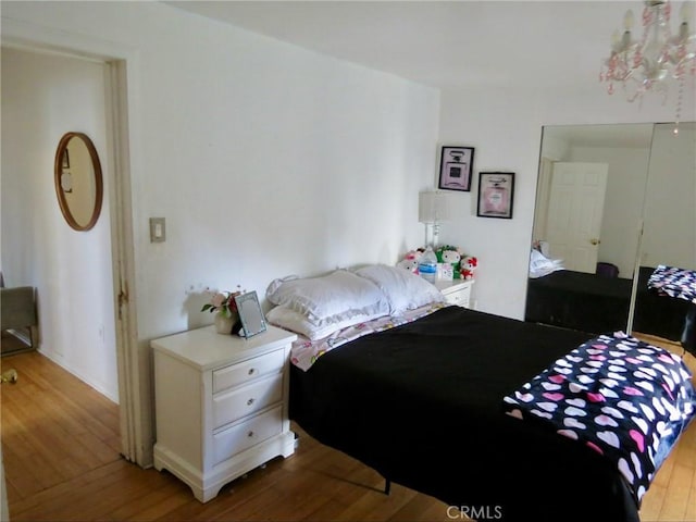 bedroom featuring hardwood / wood-style flooring