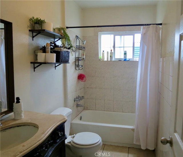 full bathroom with tile patterned flooring, vanity, toilet, and shower / bath combo with shower curtain