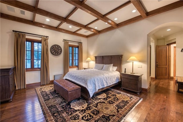 22931 Sonriente Trl, Coto De Caza, CA 92679 - bedroom featuring arched walkways, coffered ceiling, dark wood finished floors, beam ceiling, and baseboards