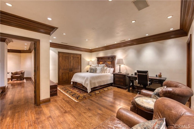22931 Sonriente Trl, Coto De Caza, CA 92679 - bedroom featuring ornamental molding, an office area, wood finished floors, recessed lighting, and baseboards