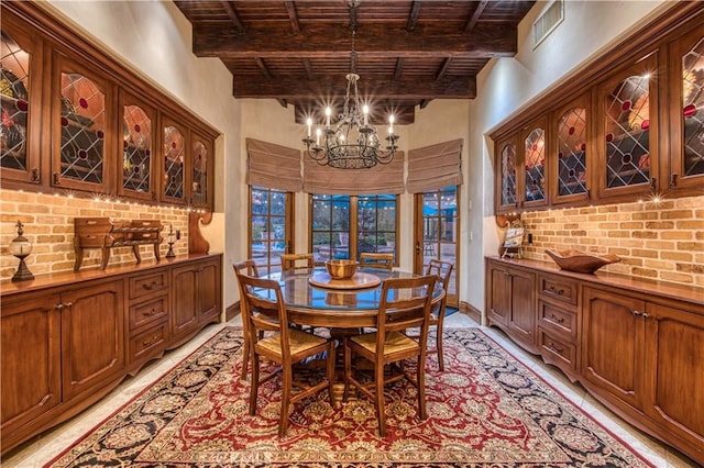 22931 Sonriente Trl, Coto De Caza, CA 92679 - dining area featuring wooden ceiling with exposed beams, a chandelier, and a towering ceiling