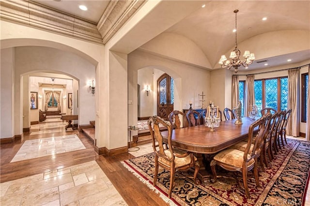 22931 Sonriente Trl, Coto De Caza, CA 92679 - dining area with arched walkways, baseboards, a chandelier, vaulted ceiling, and recessed lighting