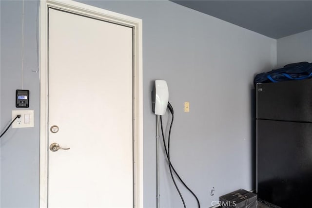 room details with black refrigerator