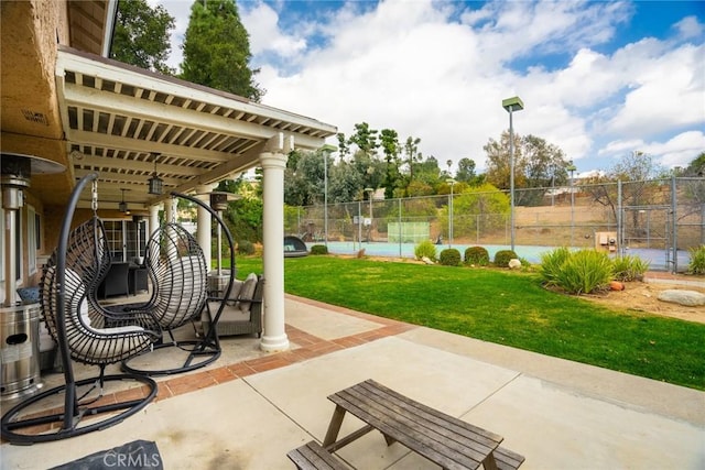 view of patio / terrace featuring a pool