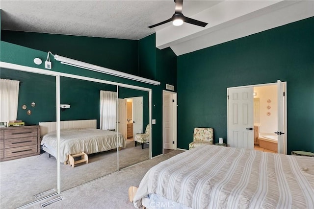 20095 Shadow Island Dr, Canyon Country, CA 91351 - carpeted bedroom with ensuite bathroom, high vaulted ceiling, ceiling fan, beam ceiling, and a closet