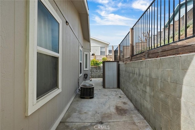 20095 Shadow Island Dr, Canyon Country, CA 91351 - view of property exterior featuring cooling unit and a patio area