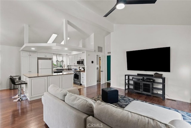 20095 Shadow Island Dr, Canyon Country, CA 91351 - living room with ceiling fan, lofted ceiling, and dark hardwood / wood-style floors