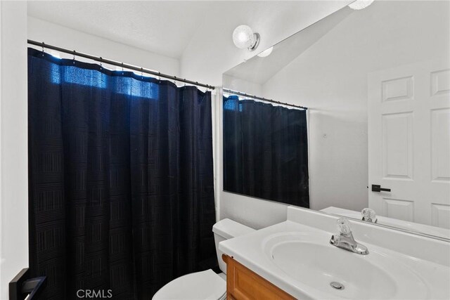 20095 Shadow Island Dr, Canyon Country, CA 91351 - bathroom featuring vanity, toilet, and a shower with shower curtain