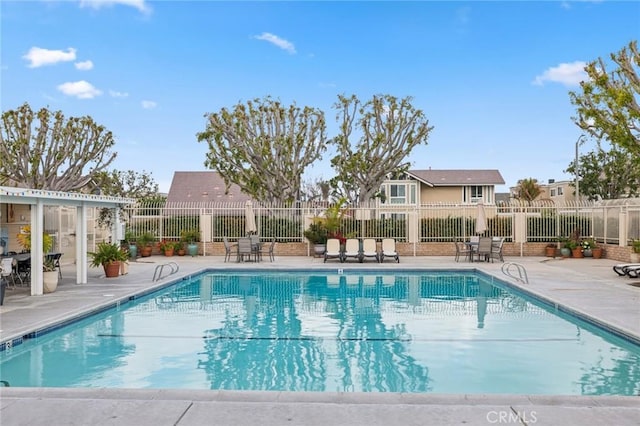 view of pool featuring a patio