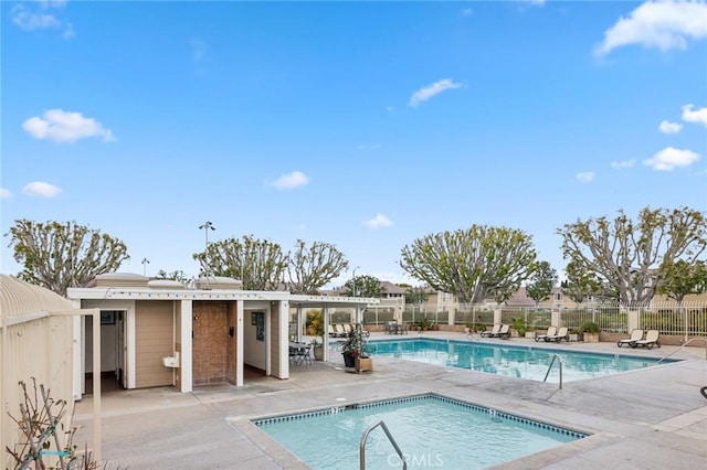 view of swimming pool featuring a patio