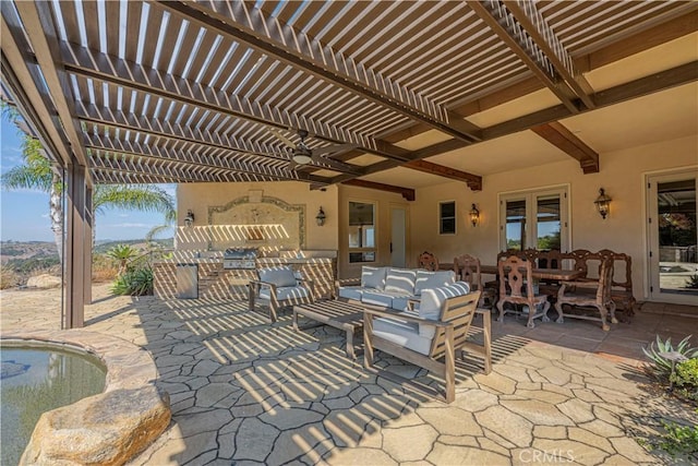 view of patio / terrace with an outdoor living space and a pergola