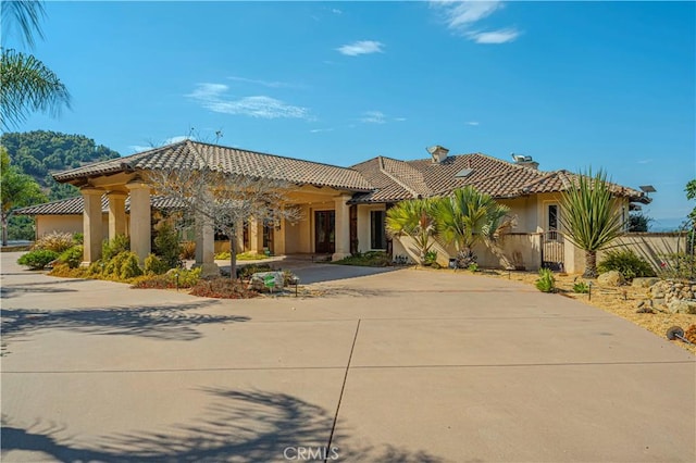 view of mediterranean / spanish house