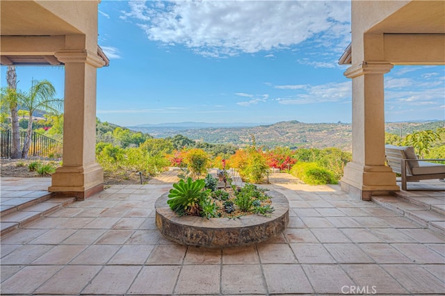 view of patio featuring a mountain view