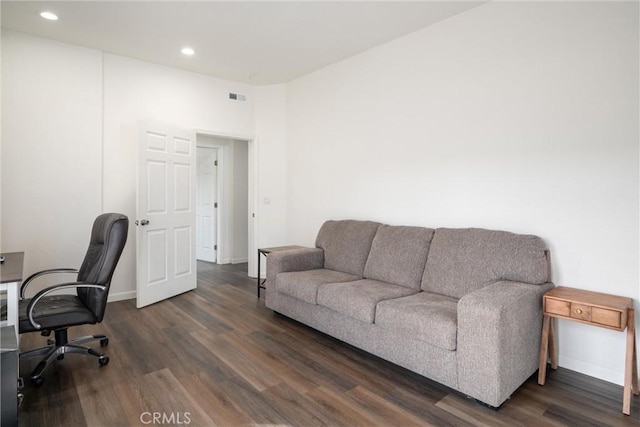 home office featuring dark hardwood / wood-style flooring