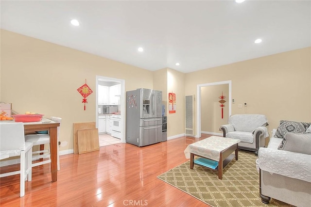 living room with hardwood / wood-style floors