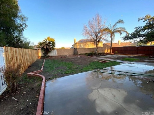 view of yard with a patio area