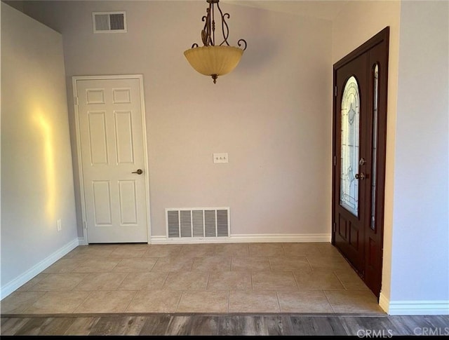 view of tiled foyer entrance