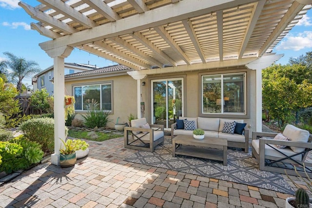 view of patio / terrace with an outdoor living space and a pergola