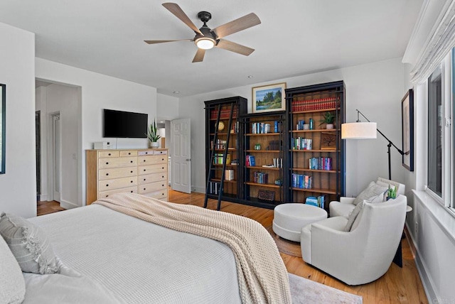 bedroom featuring ceiling fan and light wood-type flooring