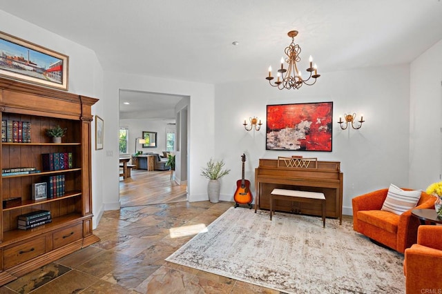 sitting room with an inviting chandelier