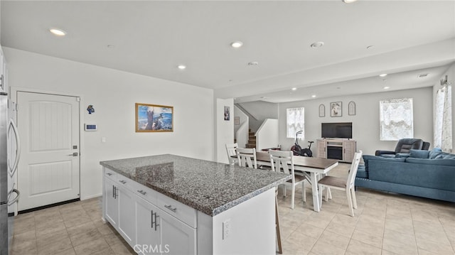 13180 Mesa Ln, Yucaipa, CA 92399 - kitchen featuring recessed lighting, healthy amount of natural light, open floor plan, and light tile patterned floors