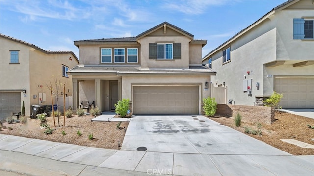 view of front of property with a garage