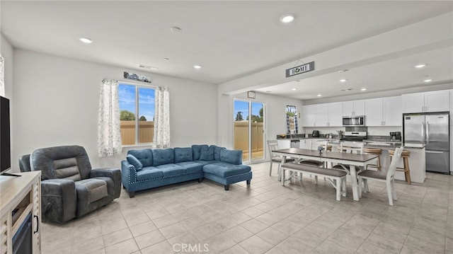13180 Mesa Ln, Yucaipa, CA 92399 - living room with plenty of natural light, recessed lighting, and light tile patterned floors