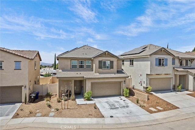 13180 Mesa Ln, Yucaipa, CA 92399 - view of front facade featuring an attached garage, stucco siding, and concrete driveway