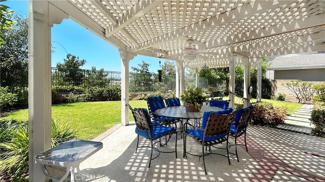 view of patio / terrace featuring outdoor dining area, a fenced backyard, and a pergola